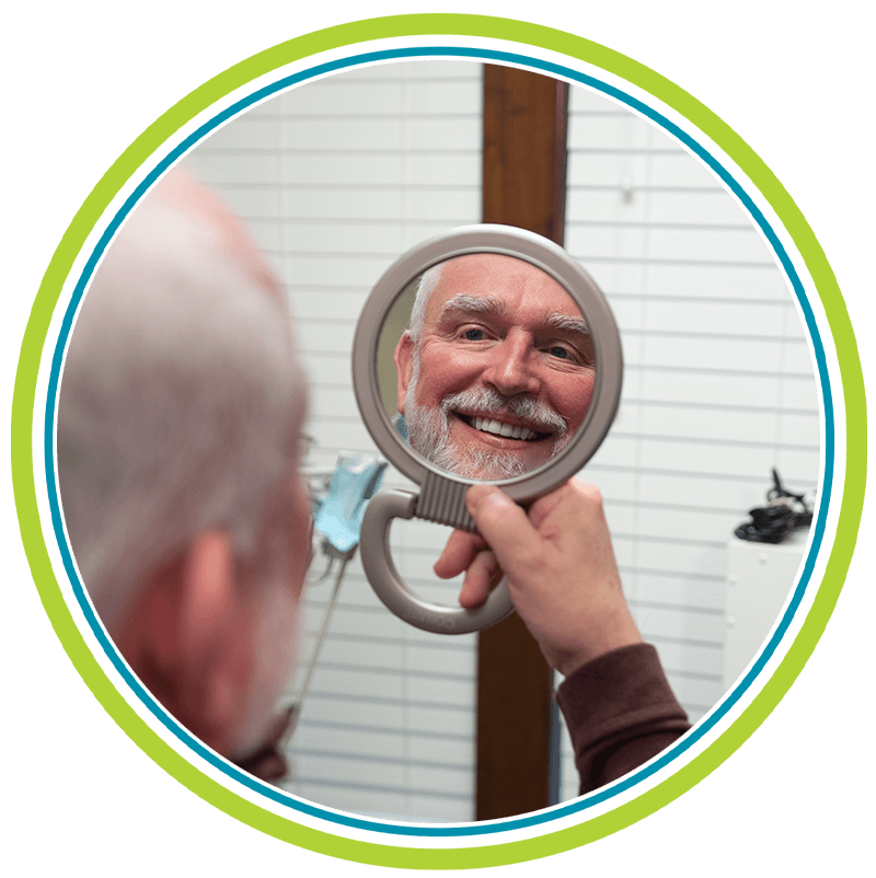 man with mirror no glasses nice smile