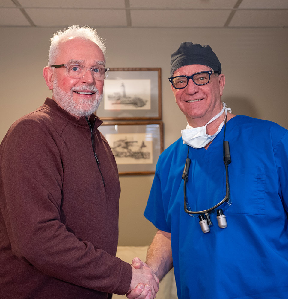 dr beard shaking hands in good faith